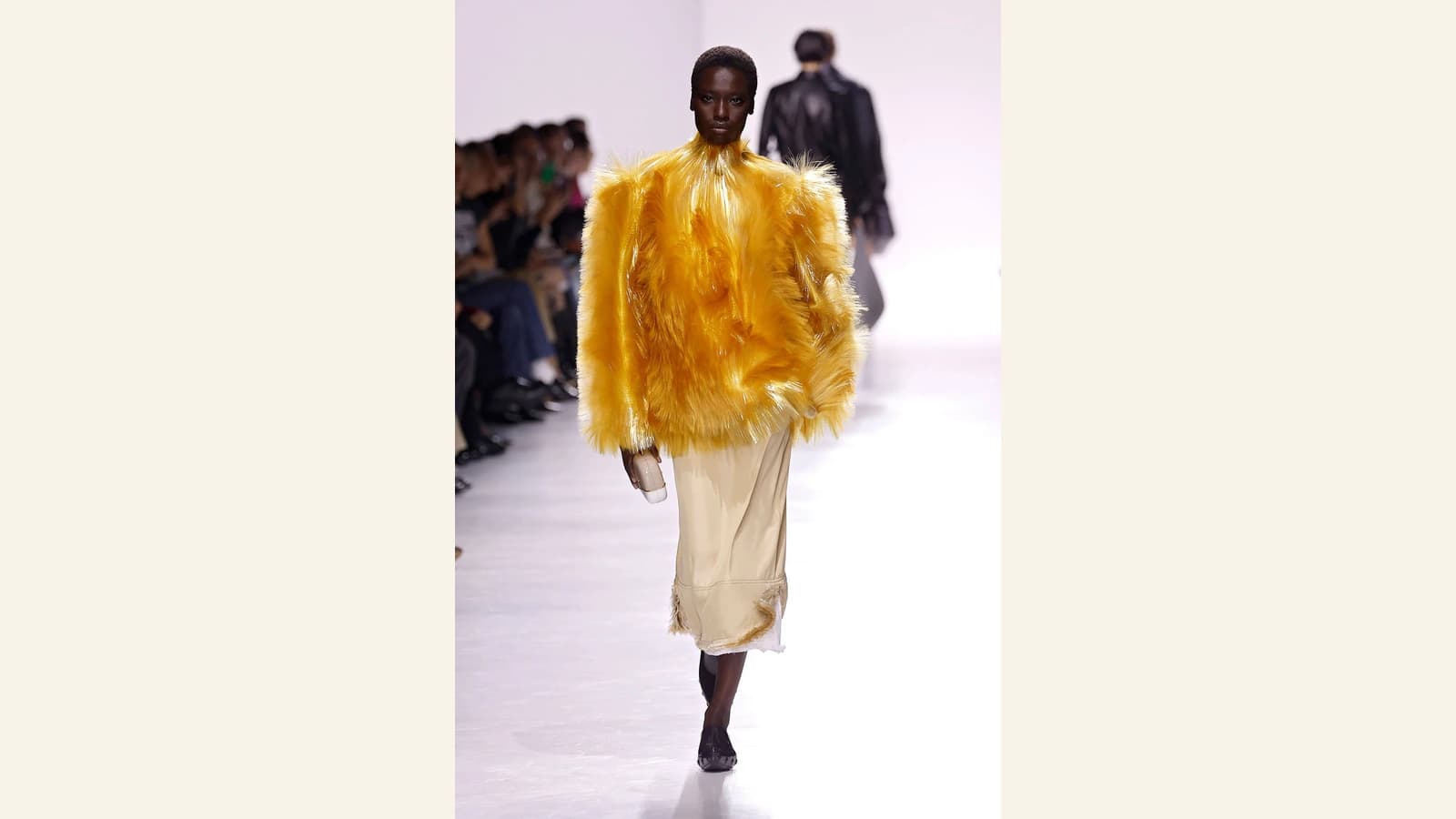 Runway reference image for Kinetic Textures: Recycled Fiberglass and Avant-Garde Fringing.
