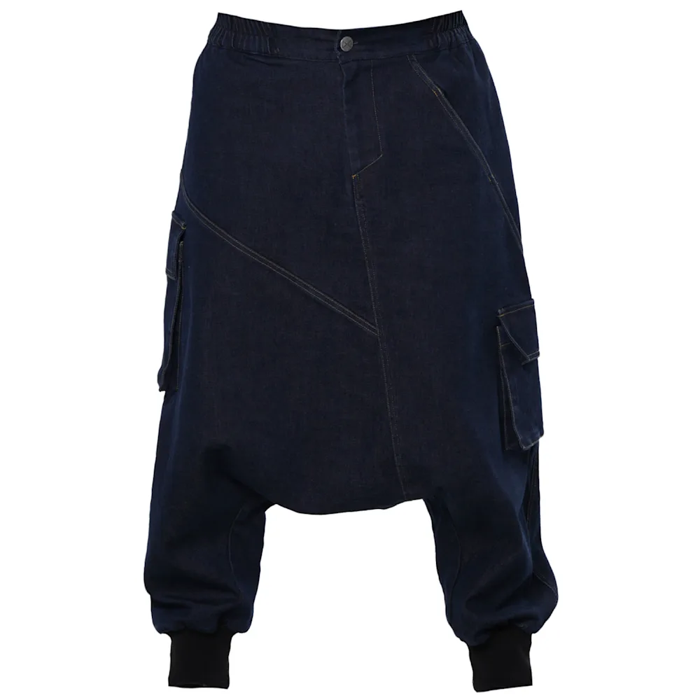 Drop crotch denim pants with a low-rise avant-garde silhouette.