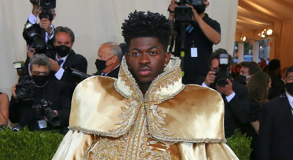 Lil Nas X wearing gold Atelier Versace armor at the 2021 Met Gala.