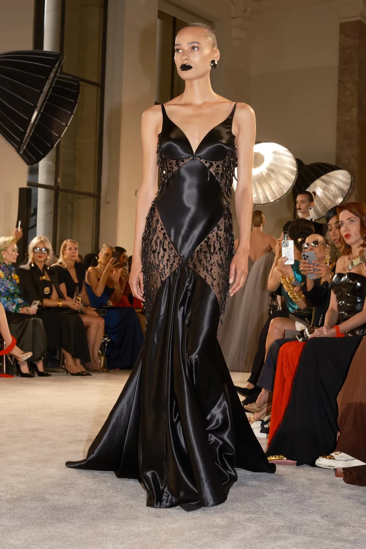 Schiaparelli Fall 2025 couture gown with an integrated rhinestone whale-tail construction.