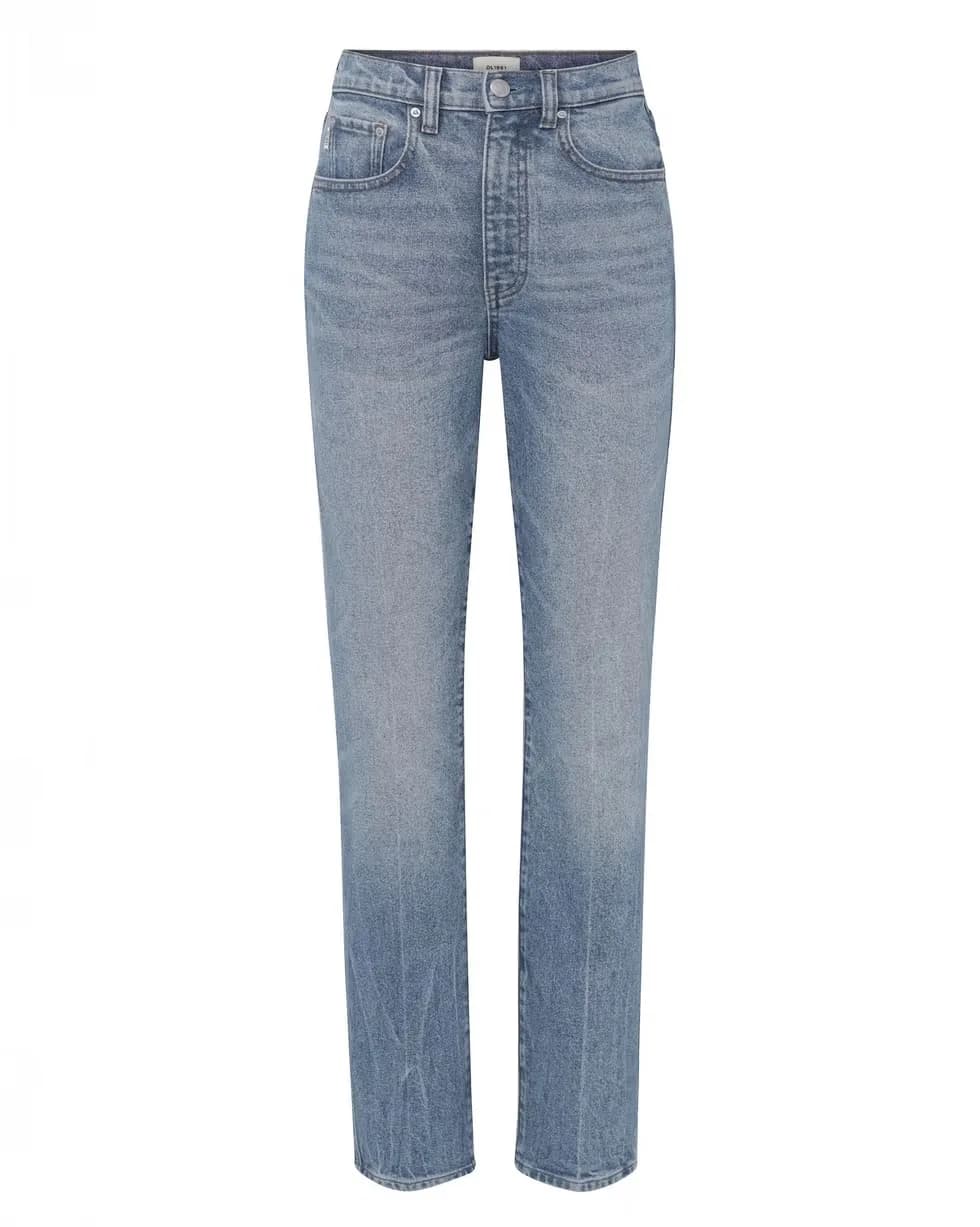 Woman wearing slim-straight cigarette jeans cropped near the ankle.